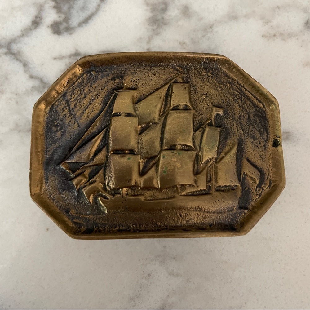 Brass tone small schooner belt buckle